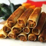 Beef Taquitos 8 ( Fresh Corn Tortillas Filled with Seasoned Shredded Beef Pinto Beens & Cheddar Cheese ) with Salsa