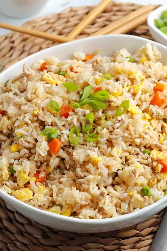 Yangzhou Fried Rice ( White, Eggs, Shrimp, Chicken, Pork, Green Onions, Yellow Onions & White Pepper)