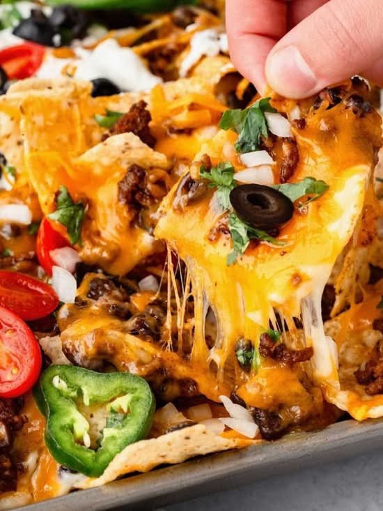 Loaded Fries Bacon, Nacho Cheese, Lettuce, Tomatoes,Jalapeno & Black Olives